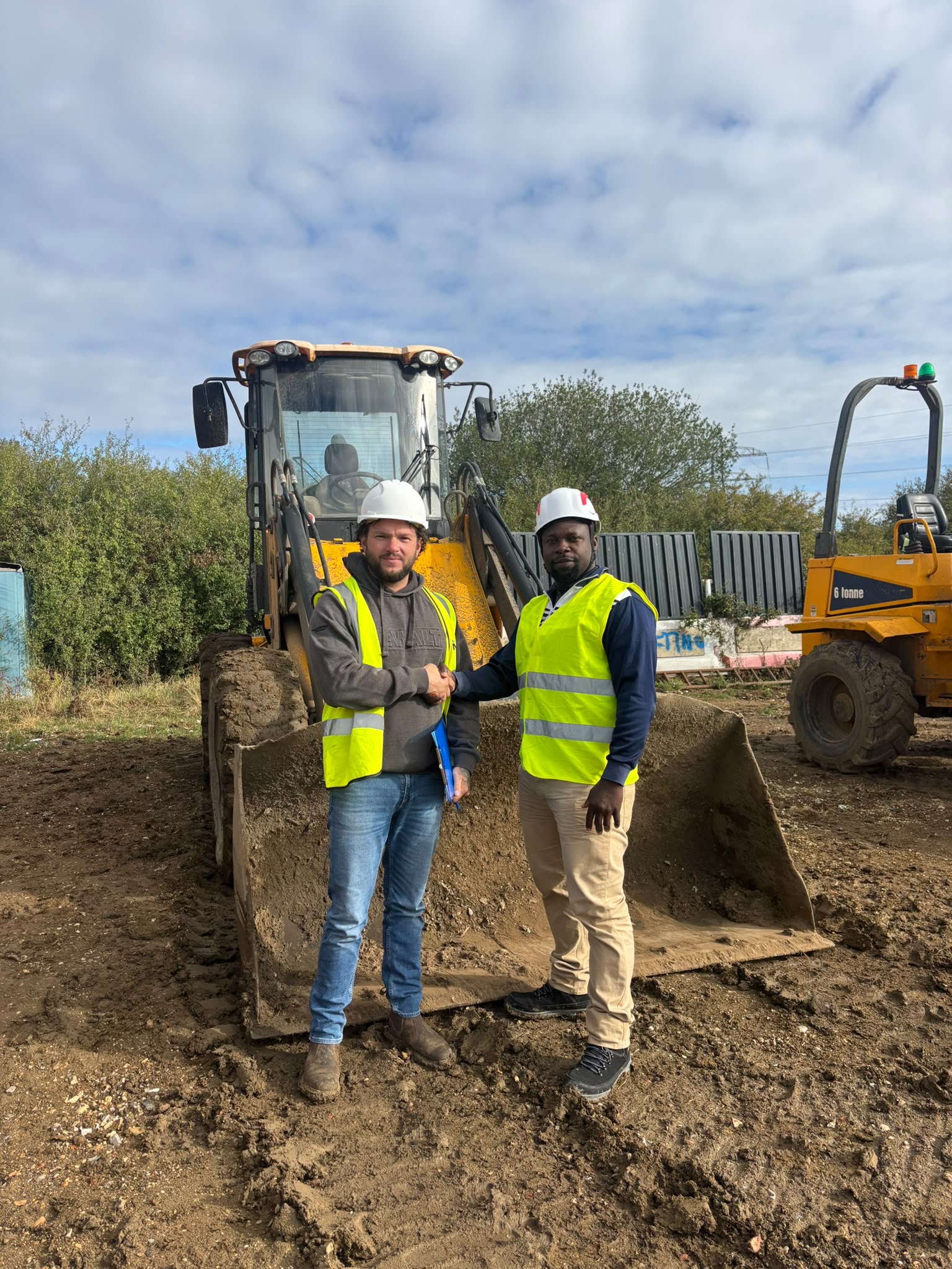 MAC instructor congratulating a novice trainee on site